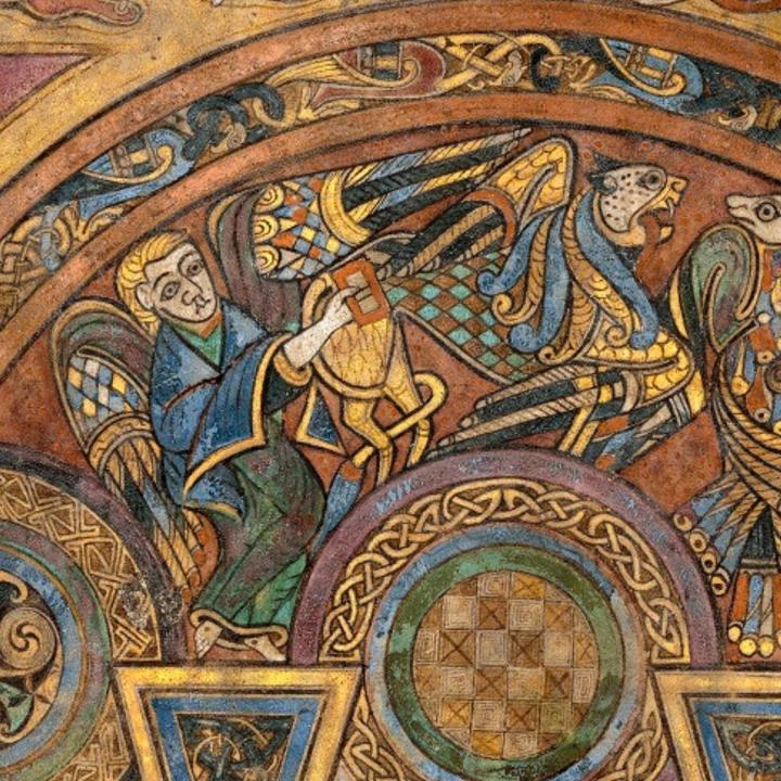 A close up of a lion with wings in the Book of Kells