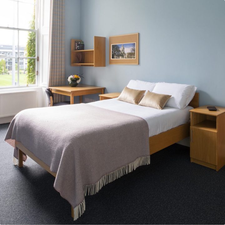 bed and desk at trinity college dublin accomodation