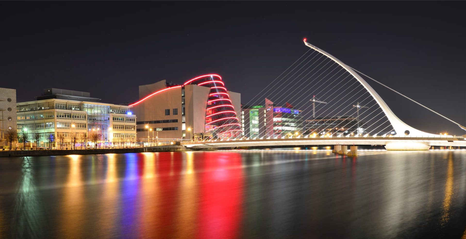 dublin docklands and river with samuel beckett bridge