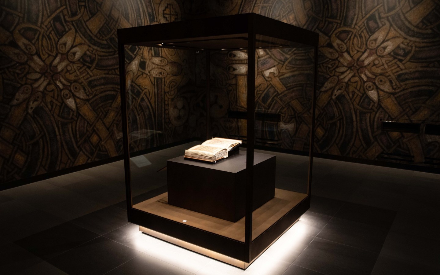 The Book of Kells on display in The Book of Kells Experience at Trinity College Dublin.